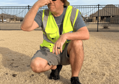 Veteran-owned dog poop removal service cleaning a residential yard in El Reno, Oklahoma.