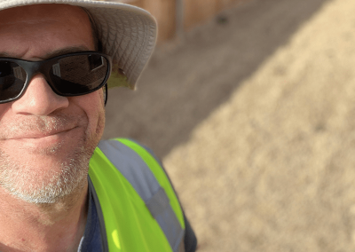 Poop Free OKC inspecting yard during dog poop cleanup.