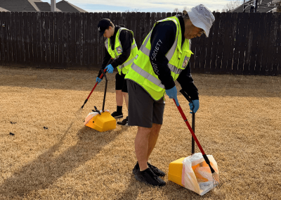Veteran-owned Poop Free OKC team cleaning dog waste.